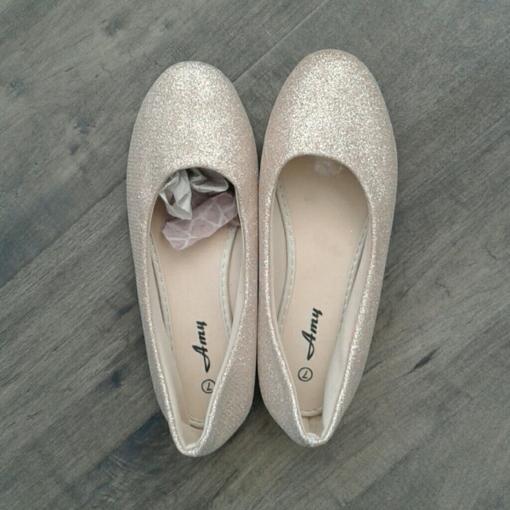 Brand new Champagne color sparkle flat size 7